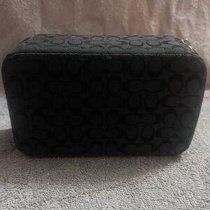 Coach Signature C Monogram Canvas
Zippered Jewelry Organizer Travel Case
Pouch